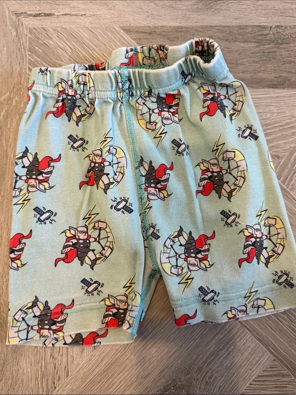 Hanna Andersson Light Blue Kids Pajama Set with Red and Black Superhero Print